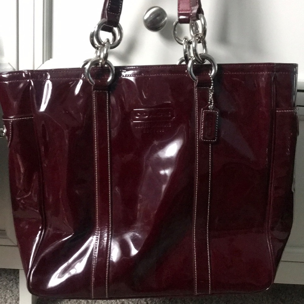 rare shiny ox blood coach purse